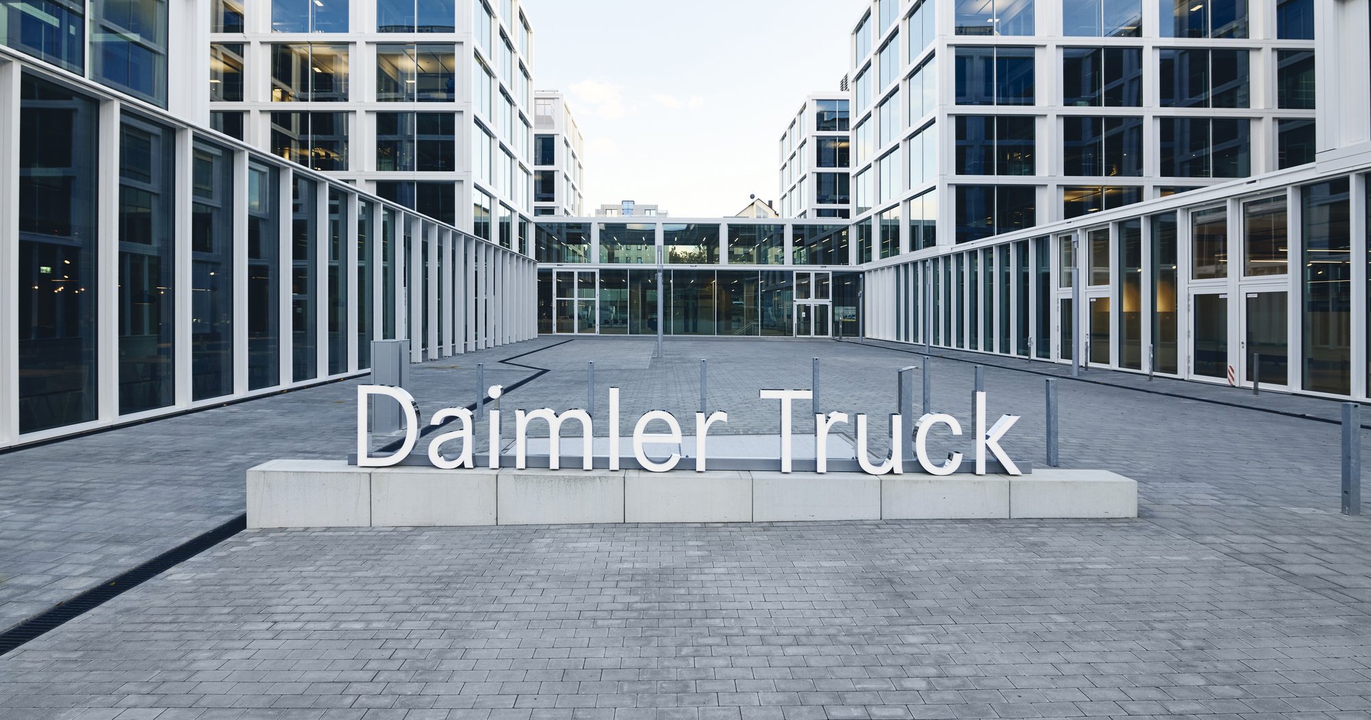Leinfelden Echterdingen, Germany. 23rd Mar, 2022. The lettering Daimler  Truck stands in front of the administration building of the truck and bus  manufacturer. The manufacturer of trucks and buses, which was spun, image size:2000x1050