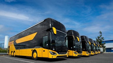 Melon yellow Setra touring coaches for Regio Jet