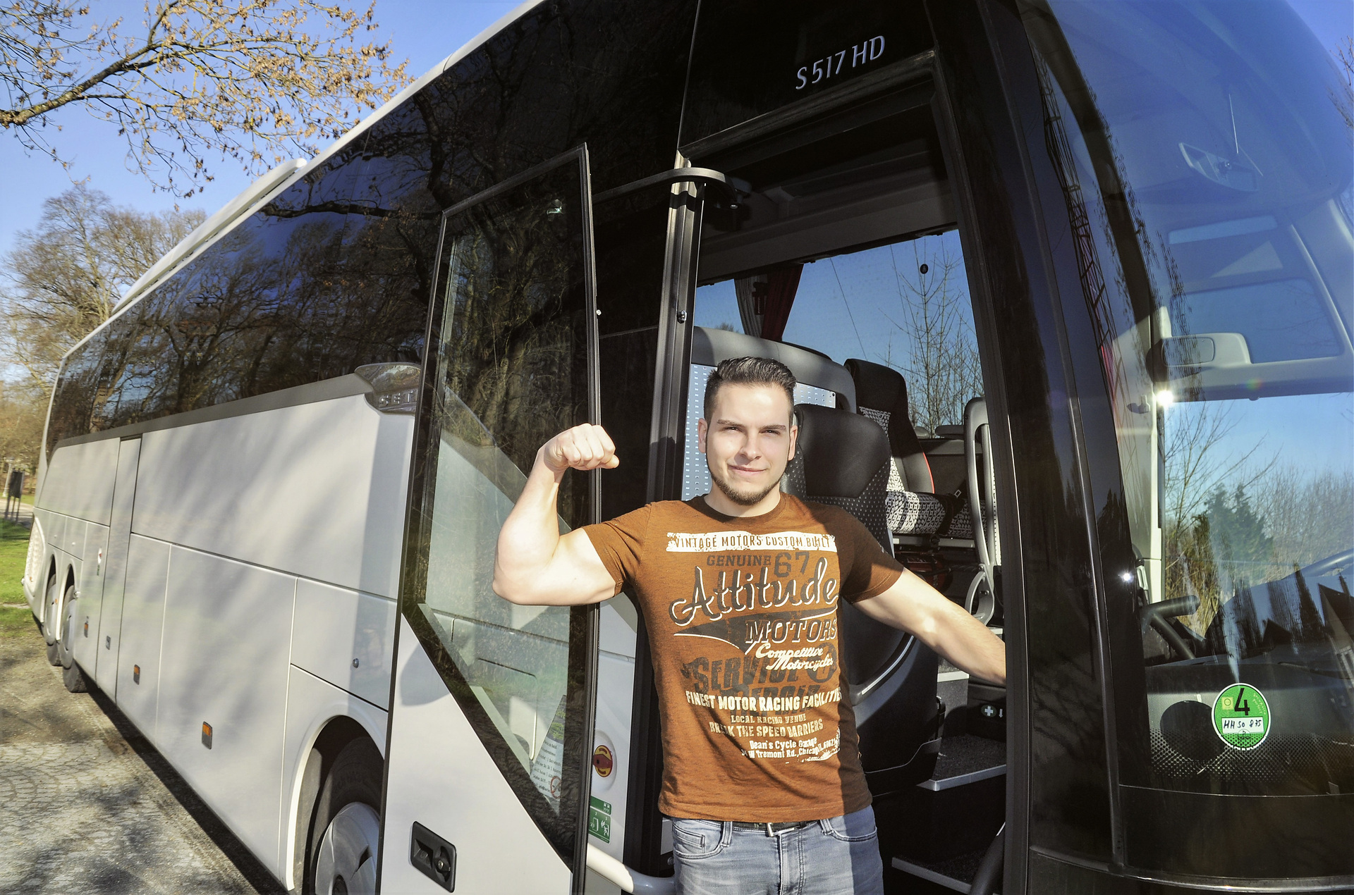 Managing Director Kevin Berberich reigning European champion in arm wrestling Setra fan strong as a bear