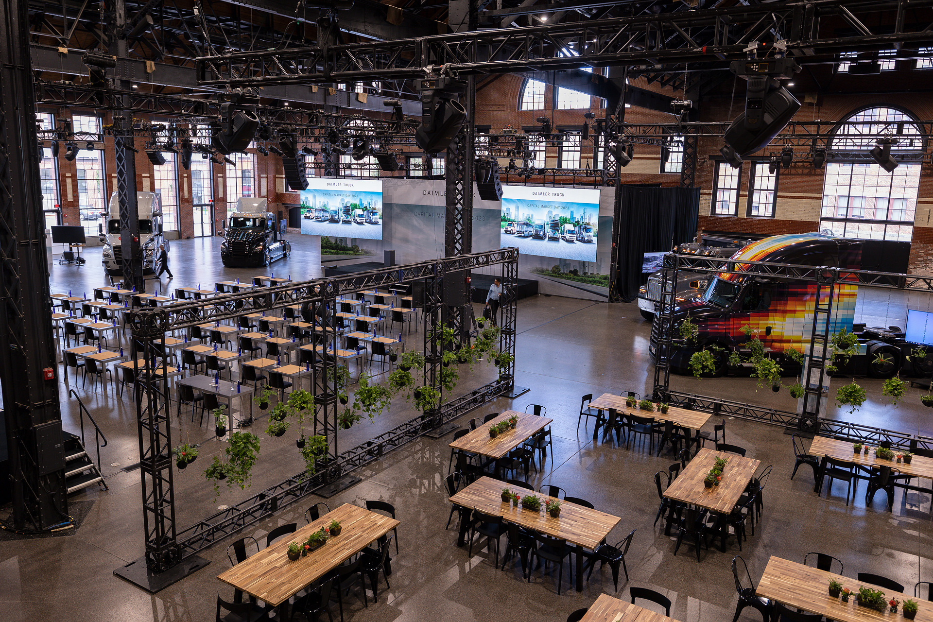 Daimler Truck Capital Market Day 2023 in Boston, on display next to the stage are a Freightliner eM2, a Freightliner eCascadia, a Western Star 47X and the Freightliner Super Truck II Daimler Truck Capital Market Day 2023 - Transforming for sustainable growth