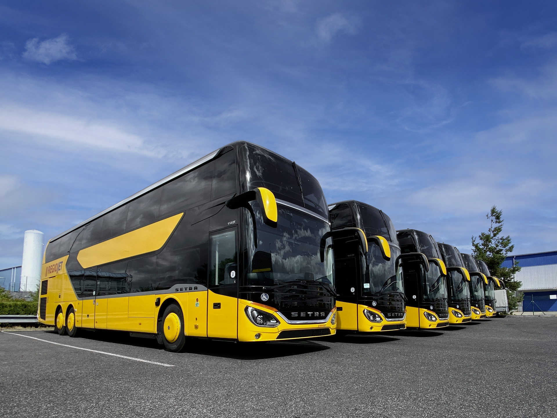 Melon yellow Setra touring coaches for Regio Jet