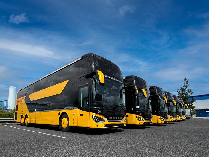 Melon yellow Setra touring coaches for Regio Jet