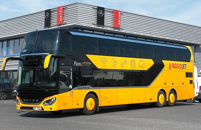 Melon yellow Setra touring coaches for Regio Jet