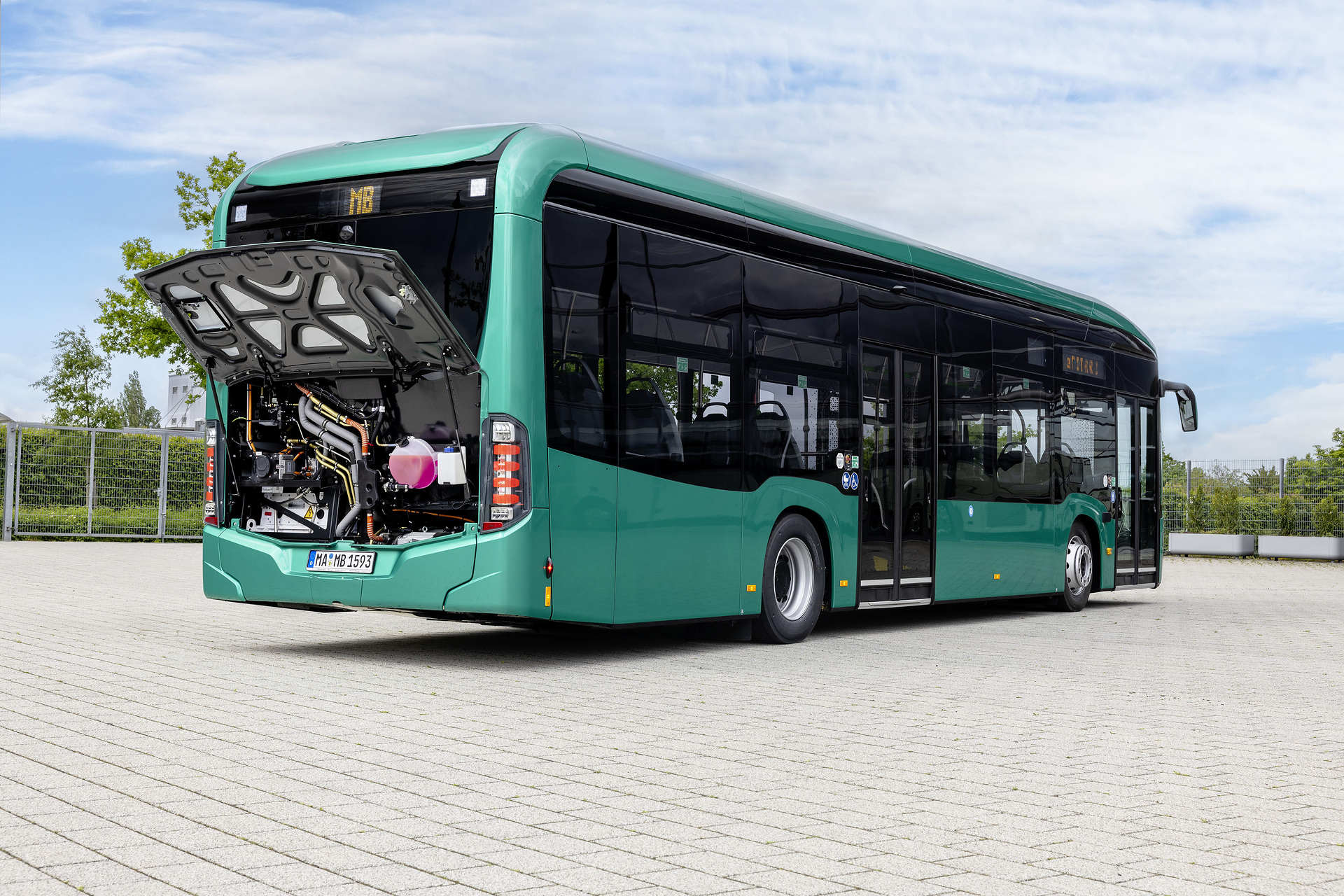 Mercedes-Benz eCitaro with all-electric drive, NMC 4 battery, exterior, green metallic, 2 x electric hub motor, 2 x 140 kW, 2 x 495 Nm, 5 battery packs with 111 kWh each, LED headlamps, Sideguard Assist 2, Preventive Brake Assist 2, Frontguard Assist, Attention Assist, Traffic Sign Assist, 360 degree camera, length/width/height: 12135/2550/3400 mm, passenger capacity: 1/88. Mercedes-Benz, Daimler Buses Solutions and Omniplus in Hamburg: Daimler Buses at the UITP Summit 2025