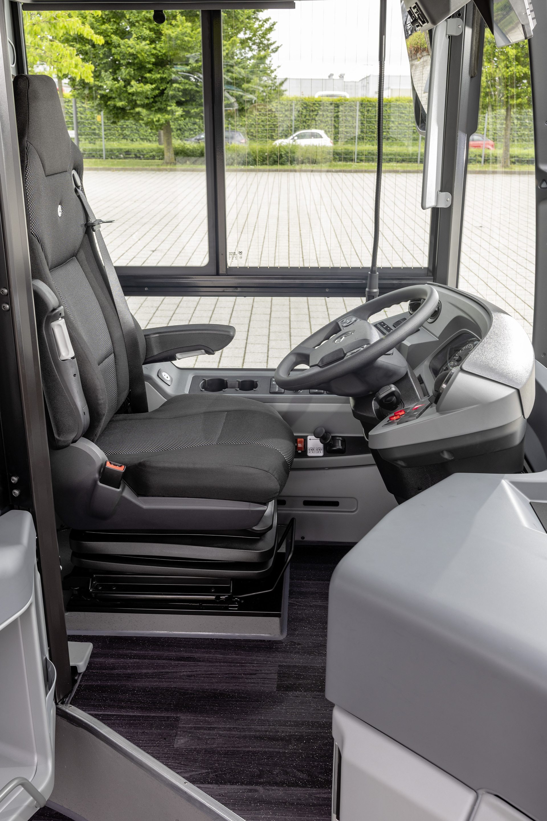 Mercedes-Benz eCitaro with all-electric drive, NMC 4 battery, interior, Seat covers: black with colorful stripes, 2 x electric hub motor, 2 x 140 kW, 2 x 495 Nm, 5 battery packs with 111 kWh each, LED headlamps, Sideguard Assist 2, Preventive Brake Assist 2, Frontguard Assist, Attention Assist, Traffic Sign Assist, 360 degree camera, length/width/height: 12135/2550/3400 mm, passenger capacity: 1/88. Mercedes-Benz, Daimler Buses Solutions and Omniplus in Hamburg: Daimler Buses at the UITP Summit 2025