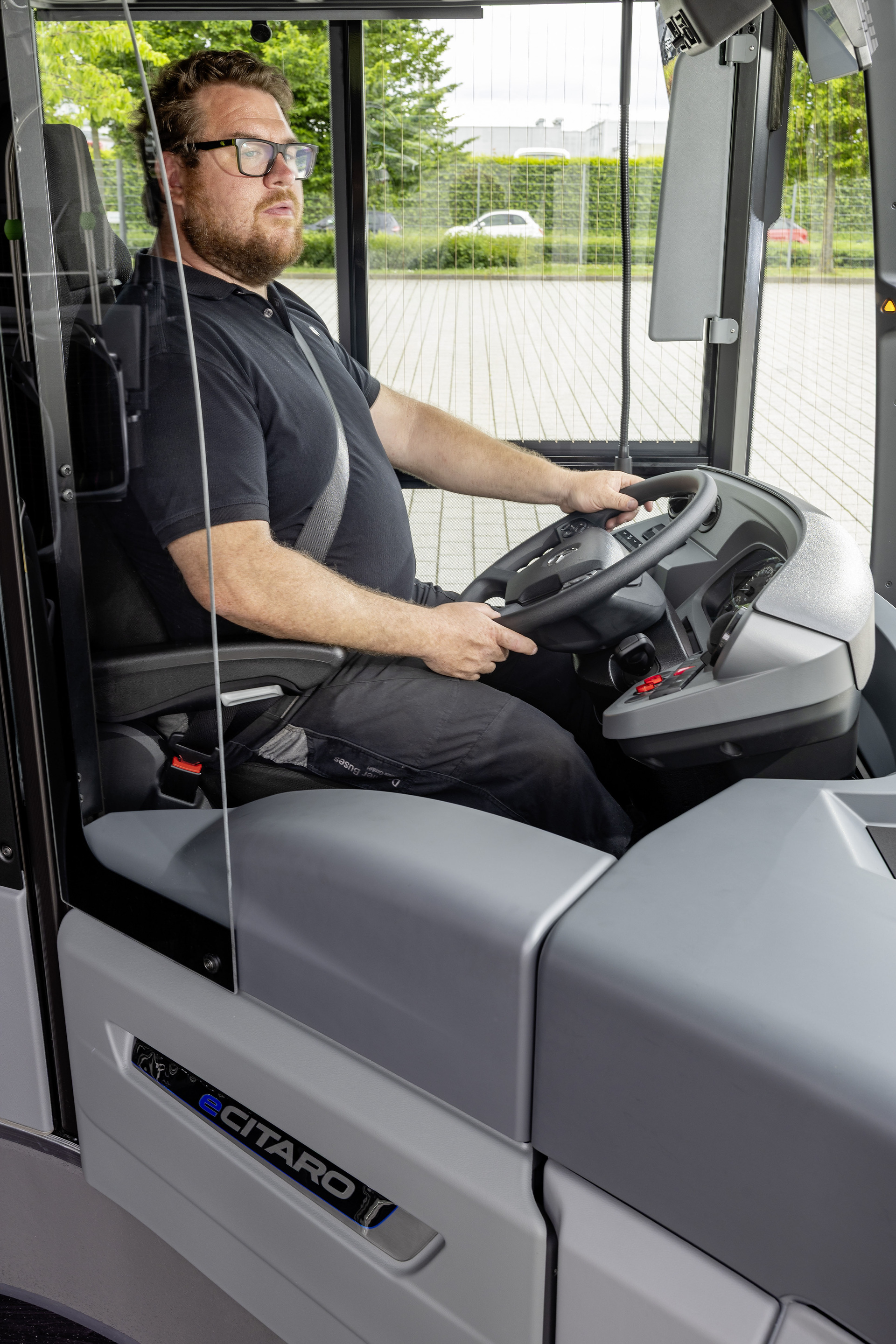 Mercedes-Benz eCitaro with all-electric drive, NMC 4 battery, interior, Seat covers: black with colorful stripes, 2 x electric hub motor, 2 x 140 kW, 2 x 495 Nm, 5 battery packs with 111 kWh each, LED headlamps, Sideguard Assist 2, Preventive Brake Assist 2, Frontguard Assist, Attention Assist, Traffic Sign Assist, 360 degree camera, length/width/height: 12135/2550/3400 mm, passenger capacity: 1/88. Mercedes-Benz, Daimler Buses Solutions and Omniplus in Hamburg: Daimler Buses at the UITP Summit 2025