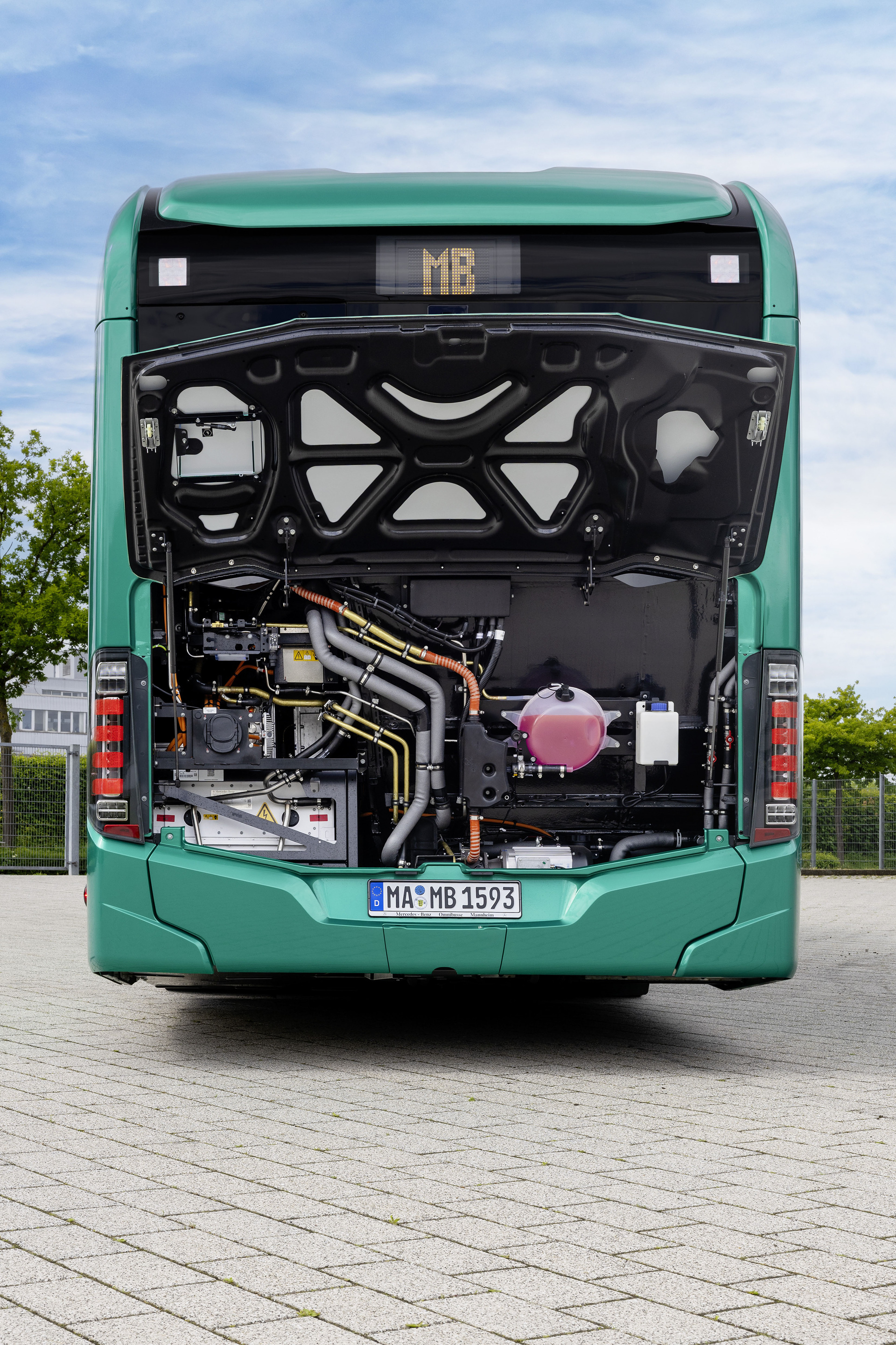 Mercedes-Benz eCitaro with all-electric drive, NMC 4 battery, exterior, green metallic, 2 x electric hub motor, 2 x 140 kW, 2 x 495 Nm, 5 battery packs with 111 kWh each, LED headlamps, Sideguard Assist 2, Preventive Brake Assist 2, Frontguard Assist, Attention Assist, Traffic Sign Assist, 360 degree camera, length/width/height: 12135/2550/3400 mm, passenger capacity: 1/88. Mercedes-Benz, Daimler Buses Solutions and Omniplus in Hamburg: Daimler Buses at the UITP Summit 2025