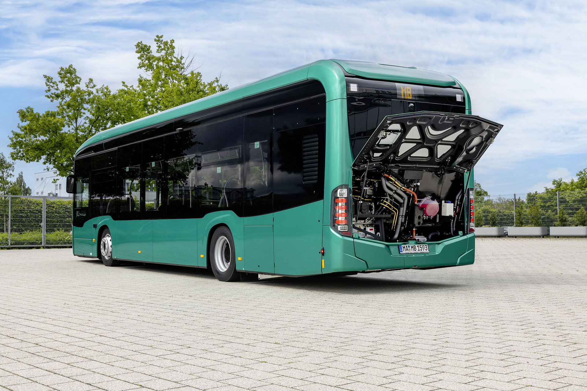 Mercedes-Benz eCitaro with all-electric drive, NMC 4 battery, exterior, green metallic, 2 x electric hub motor, 2 x 140 kW, 2 x 495 Nm, 5 battery packs with 111 kWh each, LED headlamps, Sideguard Assist 2, Preventive Brake Assist 2, Frontguard Assist, Attention Assist, Traffic Sign Assist, 360 degree camera, length/width/height: 12135/2550/3400 mm, passenger capacity: 1/88. Mercedes-Benz, Daimler Buses Solutions and Omniplus in Hamburg: Daimler Buses at the UITP Summit 2025